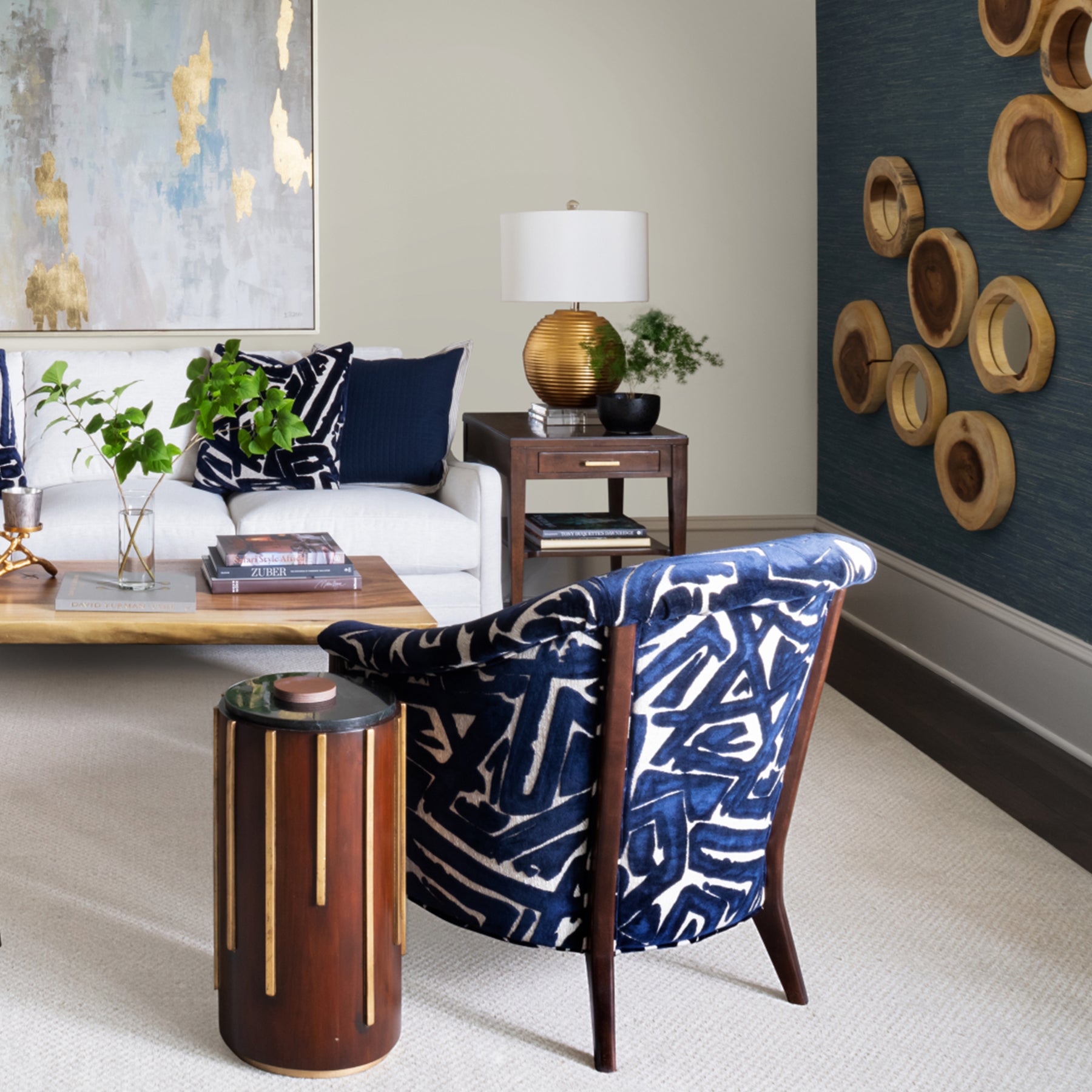 Interior Design photo from Northern Virginia condo showing patterned club chair and drink table by Jamie Merida