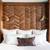 Custom made headboard by Bountiful Home - exotic wood in a chevron pattern with two gold sconces 