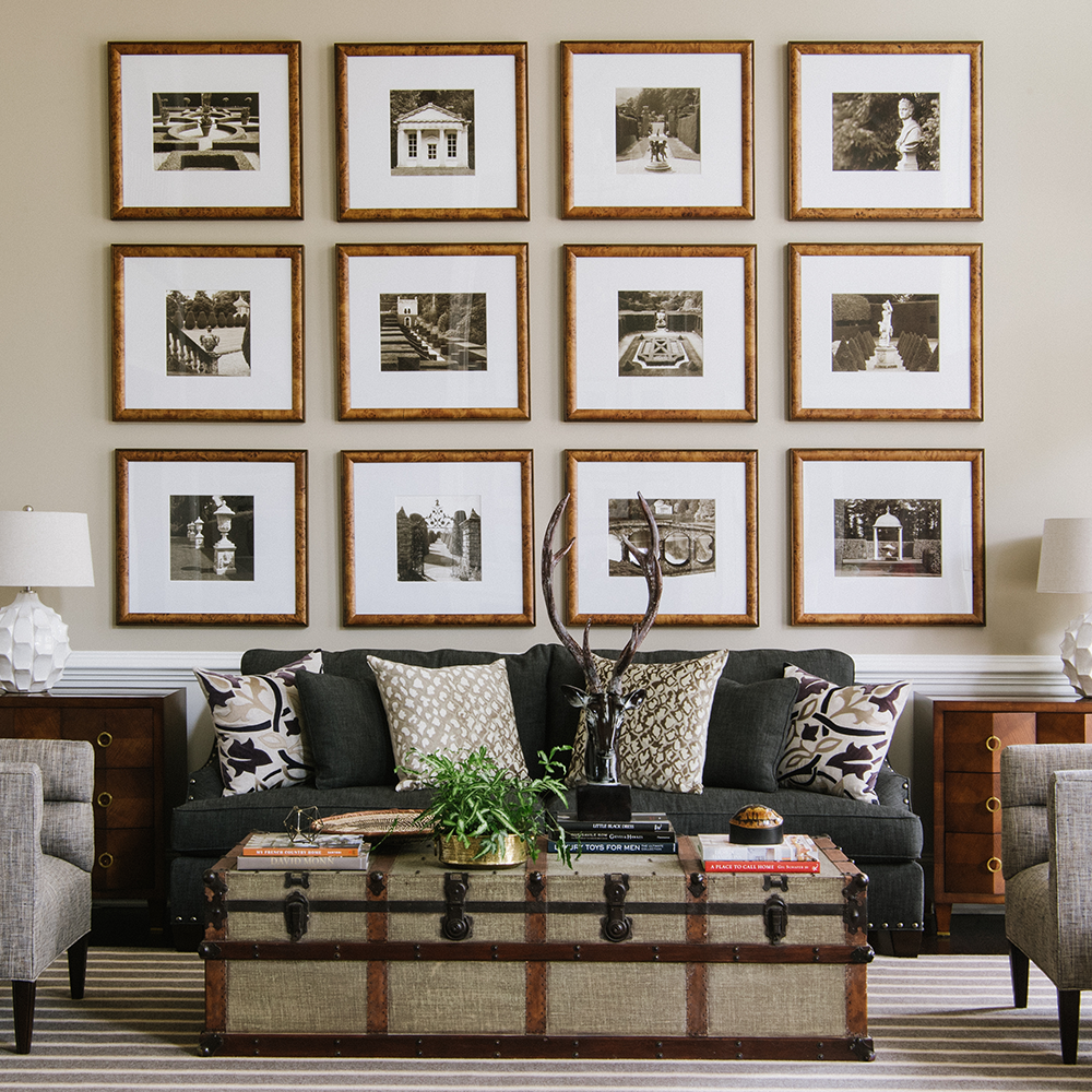 Bountiful Framing gallery wall in masculine living room space