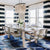 Blue and white dining room design by Jamie Merida Interiors - shows dining table, chairs, and oyster chandelier